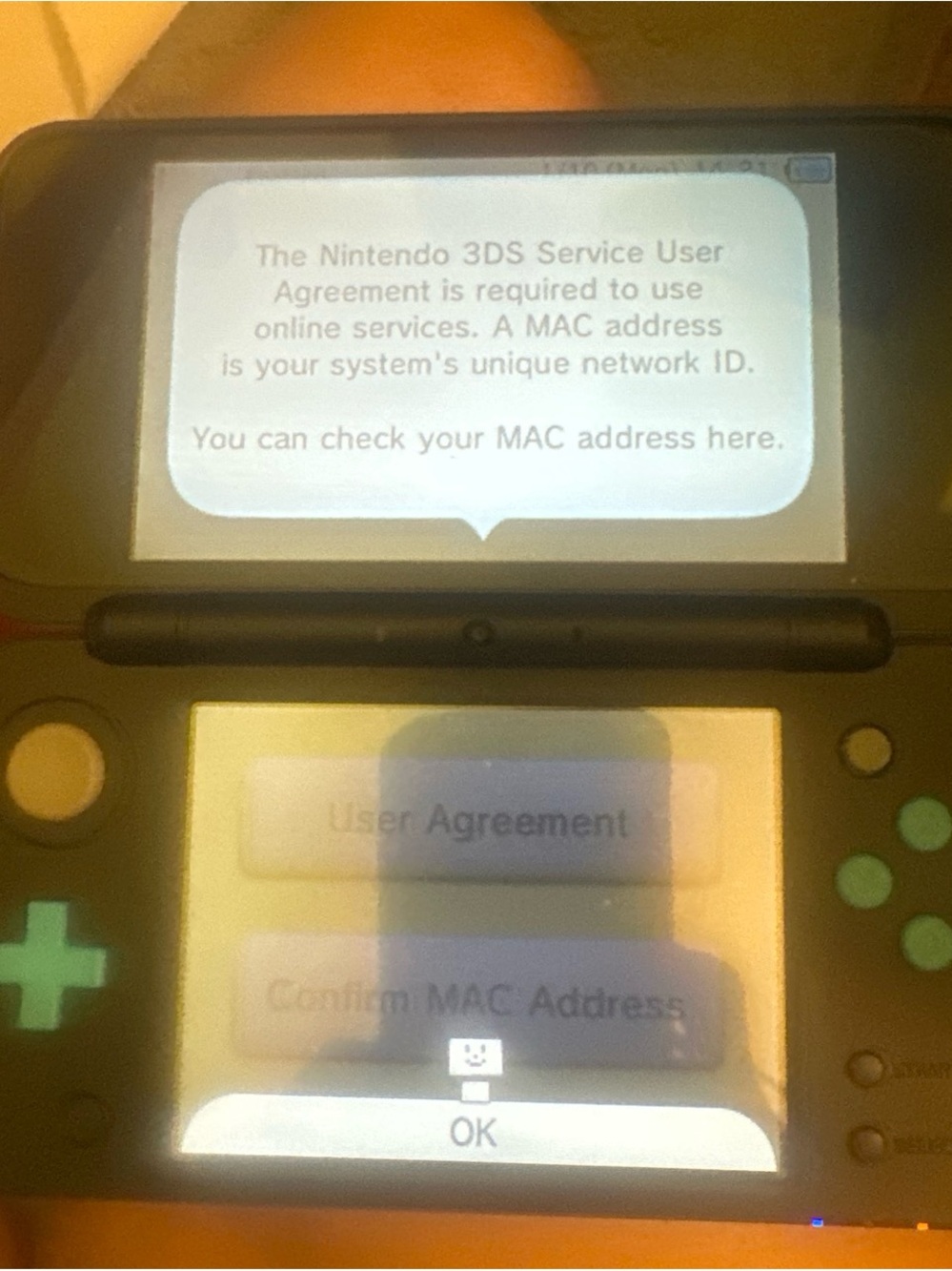 Nintendo Black Handheld Console with Cyan Buttons